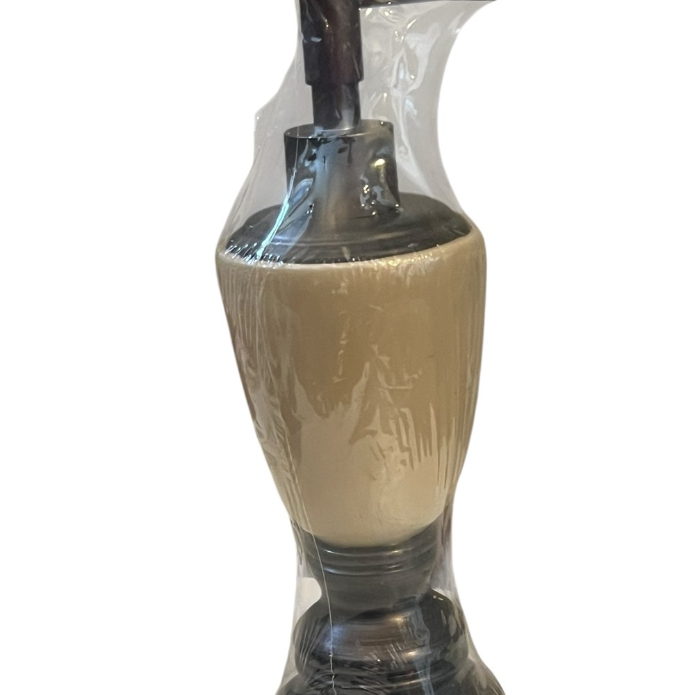 Cream and Brown bathroom soap dispenser